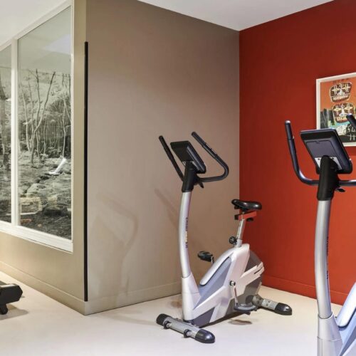 Fitnessruimte Fitnessruimte met 2 fietsen