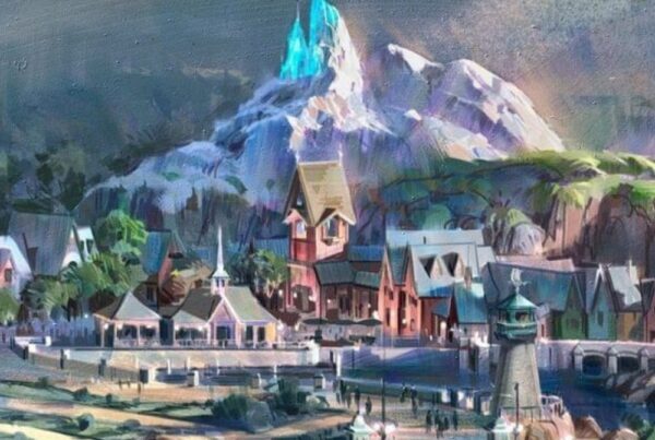 Illustratie van het dorp Arendelle met een besneeuwde bergtop in het themagebied World of Frozen.